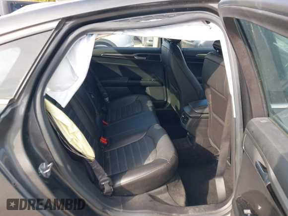 2015 Ford Fusion SE Hybrid with VIN 3FA6P0LUXFR266743, listed as a IAAI auction lot 40862039 with 116,610 mi miles. Bid and sale history available at carsss.com. Image 8.