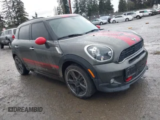 2013 MINI Countryman S ALL4 with VIN WMWZC5C54DWP34417, listed as a IAAI auction lot 41588456 with 70,047 mi miles and . Bid and sale history available at DreamBid. Image 1.