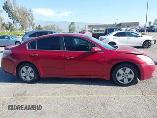 2007 Nissan Altima 2.5 with VIN 1N4AL21E37N412840, listed as a IAAI auction lot 42017823 with 186,584 mi miles. Bid and sale history available at carsss.com. Image 13.