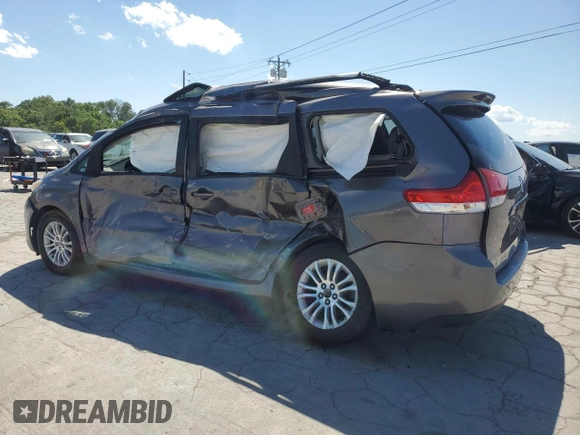 2012 Toyota Sienna XLE AAS with VIN 5TDYK3DC4CS197176, listed as a Copart auction lot 57942845 with Not provided miles and Salvage title. Bid and sale history available at DreamBid. Image 2.