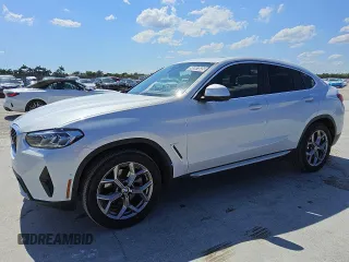 2024 BMW X4 xDrive30i z VIN 5UX33DT09R9W70709, wystawiony jako Copart lot #56997035 z przebiegiem 21 308 mil mil oraz Tytuł czysty. Historia ofert i sprzedaży dostępna na DreamBid. Obrazek 1.