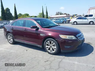 2011 Ford Taurus SEL with VIN 1FAHP2EW8BG137937, listed as a IAAI auction lot 42107586 with 143,525 mi miles. Bid and sale history available at carsss.com. Image 1.