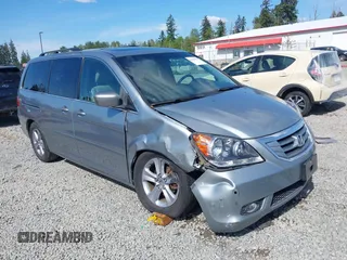 2008 Honda Odyssey Touring with VIN 5FNRL38908B101149, listed as a IAAI auction lot 42331941 with 202,915 mi miles and . Bid and sale history available at DreamBid. Image 1.