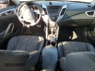 2014 Hyundai Veloster z VIN KMHTC6AD3EU217143, wystawiony jako Copart lot #43716395 z przebiegiem 137 865 mil mil oraz Szkoda całkowita • Salvage title. Historia ofert i sprzedaży dostępna na DreamBid. Obrazek 8.