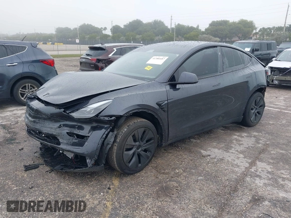 2024 Tesla Model Y with VIN 7SAYGDED8RF213927, listed as a IAAI auction lot 41386687 with 3,599 mi miles and . Bid and sale history available at DreamBid. Image 17.