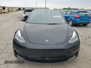 2023 Tesla Model 3 with VIN 5YJ3E1EA7PF599058, listed as a Copart auction lot 57331365 with Not provided miles and Non repairable. Bid and sale history available at DreamBid. Image 5.