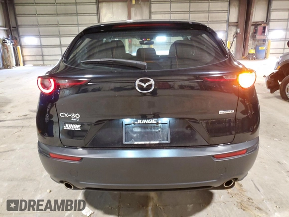 2021 Mazda CX-30 S with VIN 3MVDMBAL2MM207744, listed as a Copart auction lot 55399965 with 49,089 mi miles and Salvage title. Bid and sale history available at DreamBid. Image 6.