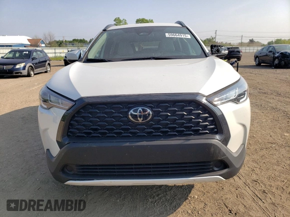2023 Toyota Corolla Cross LE with VIN 7MUCAABG3PV060880, listed as a Copart auction lot 59664915 with 18,246 mi miles and Salvage title. Bid and sale history available at DreamBid. Image 5.