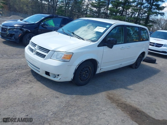 2010 Dodge Grand Caravan SE with VIN 2D4RN4DE0AR107498, listed as a IAAI auction lot 42048596 with 242,643 mi miles. Bid and sale history available at carsss.com. Image 2.