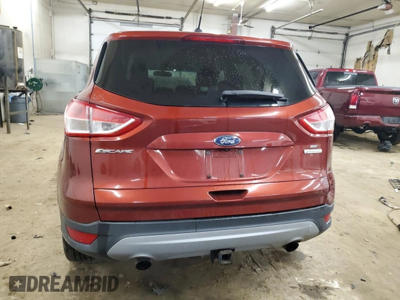 2016 Ford Escape SE z VIN 1FMCU0G9XGUB59807, wystawiony jako Copart lot #57920065 z przebiegiem 124 482 mil mil oraz Szkoda całkowita • Salvage title. Historia ofert i sprzedaży dostępna na DreamBid. Obrazek 6.