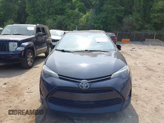 2018 Toyota Corolla L with VIN 2T1BURHE1JC052651, listed as a IAAI auction lot 42430958 with 104,664 mi miles and . Bid and sale history available at DreamBid. Image 12.