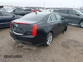 2014 Cadillac ATS Standard RWD with VIN 1G6AA5RX5E0104427, listed as a IAAI auction lot 41542467 with 83,351 mi miles and . Bid and sale history available at DreamBid. Image 4.