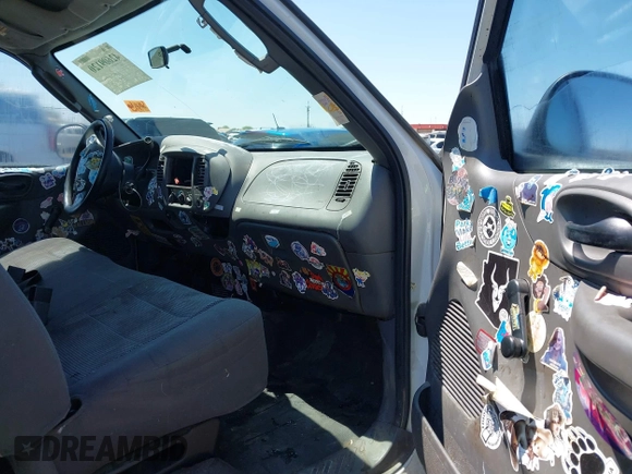 2003 Ford F-150 XL with VIN 2FTRF17W73CA77144, listed as a IAAI auction lot 42609120 with 102,490 mi miles and . Bid and sale history available at DreamBid. Image 5.