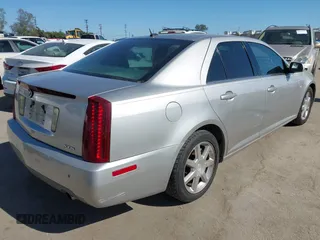 2005 Cadillac STS z VIN 1G6DW677350224198, wystawiony jako IAAI lot #42321639 z przebiegiem 122 208 mil mil oraz . Historia ofert i sprzedaży dostępna na DreamBid. Obrazek 4.