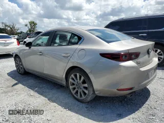 2023 Mazda 3 S Select with VIN 3MZBPABM7PM370974, listed as a Copart auction lot 61951505 with 58,845 mi miles and Salvage title. Bid and sale history available at DreamBid. Image 2.