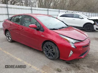 2017 Toyota Prius Two z VIN JTDKARFU4H3542166, wystawiony jako IAAI lot #42091752 z przebiegiem 60 889 mil mil oraz . Historia ofert i sprzedaży dostępna na DreamBid. Obrazek 1.