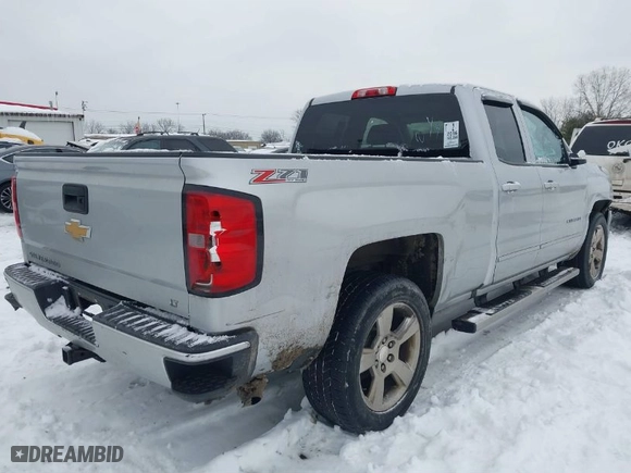 2016 Chevrolet Silverado 1500 LT with VIN 1GCVKREC4GZ213014, listed as a IAAI auction lot 41257467 with 148,594 mi miles. Bid and sale history available at carsss.com. Image 4.