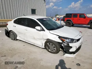 2023 Kia Rio S with VIN 3KPA24AD7PE549736, listed as a Copart auction lot 50428615 with 34,431 mi miles and Salvage Title. Bid and sale history available at carsss.com. Image 4.