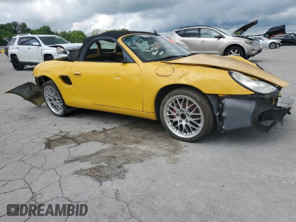 2002 Porsche Boxster with VIN WP0CA29842U621851, listed as a Copart auction lot 56872965 with Not provided miles and Clean title. Bid and sale history available at DreamBid. Image 4.