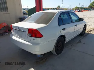 2003 Honda Civic LX with VIN 2HGES16513H517530, listed as a IAAI auction lot 42111453 with 216,814 mi miles. Bid and sale history available at carsss.com. Image 4.