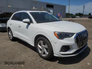 2020 Audi Q3 Premium with VIN WA1AECF32L1031641, listed as a Copart auction lot 60266275 with 43,730 mi miles and Salvage title. Bid and sale history available at DreamBid. Image 4.