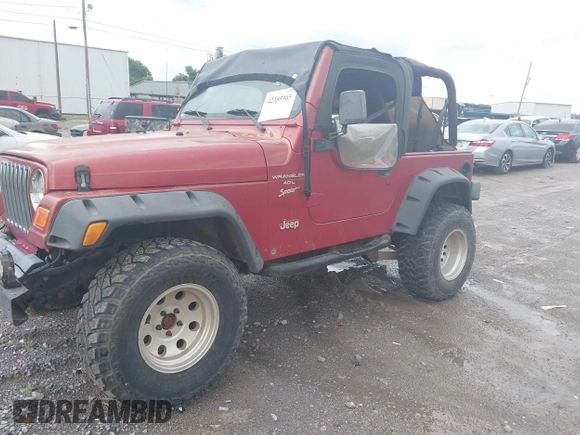 2000 Jeep Wrangler Sport with VIN 1J4FA49S2YP764321, listed as a IAAI auction lot 42385965 with Not provided miles and . Bid and sale history available at DreamBid. Image 2.