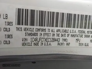 2014 Jeep Grand Cherokee Overland with VIN 1C4RJFCTXEC128443, listed as a IAAI auction lot 40512681 with 126,379 mi miles. Bid and sale history available at carsss.com. Image 9.