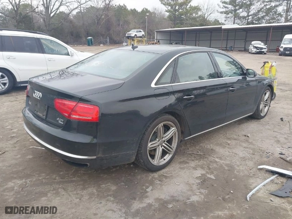 2013 Audi A8 L 4.0L with VIN WAUR2AFD6DN029705, listed as a IAAI auction lot 41476842 with 162,749 mi miles. Bid and sale history available at carsss.com. Image 4.