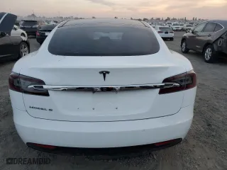 2016 Tesla Model S 70 kWh Battery with VIN 5YJSA1E19GF151945, listed as a Copart auction lot 83851454 with 74,473 mi miles and Non Repairable. Bid and sale history available at carsss.com. Image 6.