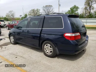 2007 Honda Odyssey EX with VIN 5FNRL38477B101619, listed as a Copart auction lot 54134505 with 129,468 mi miles and Clean title. Bid and sale history available at DreamBid. Image 2.