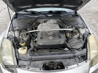 2003 Nissan 350Z Performance z VIN JN1AZ34D33T106988, wystawiony jako Copart lot #57933985 z przebiegiem 203 959 mil mil oraz Szkoda całkowita • Salvage title. Historia ofert i sprzedaży dostępna na DreamBid. Obrazek 11.