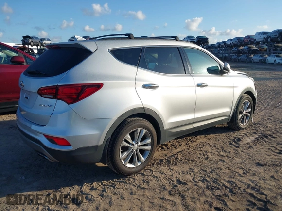 2018 Hyundai Santa Fe 2.0T z VIN 5XYZU4LA1JG516466, wystawiony jako IAAI lot #42265607 z przebiegiem 110 655 mil mil oraz . Historia ofert i sprzedaży dostępna na DreamBid. Obrazek 4.