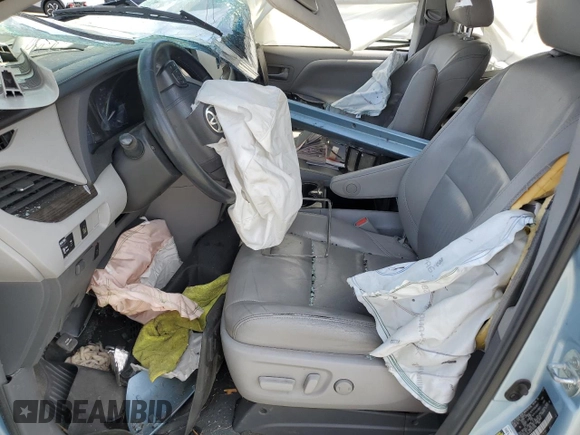 2015 Toyota Sienna XLE с VIN 5TDYK3DC8FS557294, выставлен на аукционе Copart как лот 57247845 с пробегом Не указан миль и Списание • Salvage title. История ставок и продаж доступна на DreamBid. Изображение 7.
