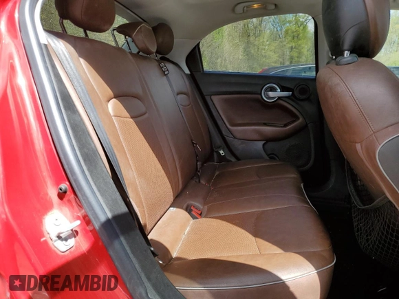 2016 FIAT 500X Lounge z VIN ZFBCFYDT4GP389082, wystawiony jako Copart lot #53291915 z przebiegiem 117 153 mil mil oraz Szkoda całkowita • Salvage title. Historia ofert i sprzedaży dostępna na DreamBid. Obrazek 11.