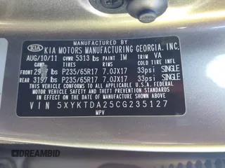 2012 Kia Sorento LX with VIN 5XYKTDA25CG235127, listed as a IAAI auction lot 41804019 with 176,000 mi miles. Bid and sale history available at carsss.com. Image 9.