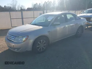2009 Ford Taurus SEL with VIN 1FAHP24W29G109935, listed as a IAAI auction lot 41467859 with 326,278 mi miles. Bid and sale history available at carsss.com. Image 2.