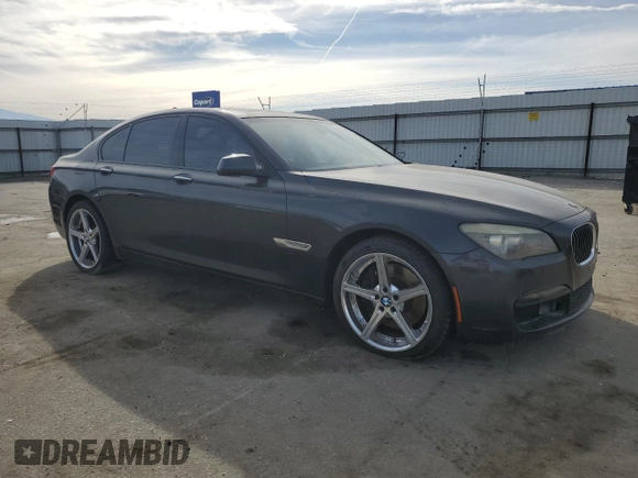 2012 BMW 7 Series 750i with VIN WBAKA8C58CDS99694, listed as a Copart auction lot 46828435 with 131,458 mi miles and Salvage title. Bid and sale history available at DreamBid. Image 4.