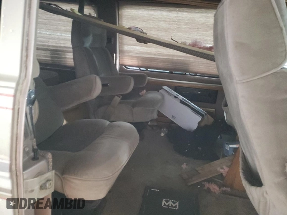 1994 Chevrolet Chevy Van с VIN 1GBEG25K1RF112313, выставлен на аукционе Copart как лот 44793415 с пробегом 162 067 миль миль и Списание • Salvage title. История ставок и продаж доступна на DreamBid. Изображение 11.