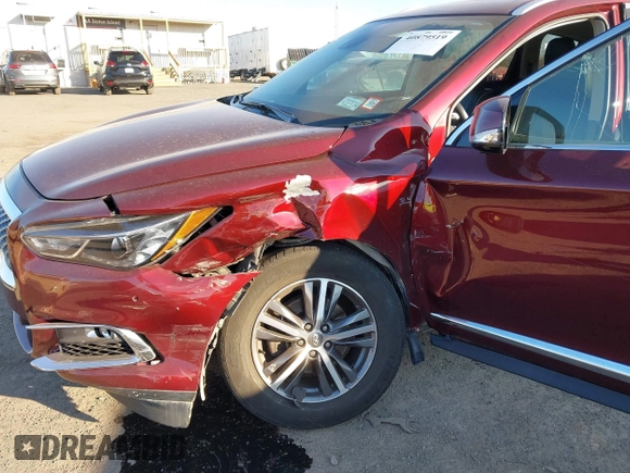 2020 Infiniti QX60 Luxe with VIN 5N1DL0MM0LC511566, listed as a IAAI auction lot 40879519 with 90,479 mi miles and . Bid and sale history available at DreamBid. Image 6.
