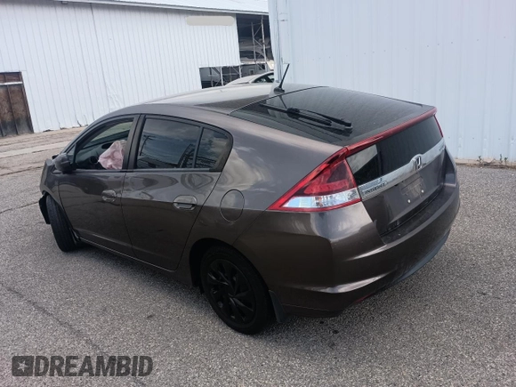 2012 Honda Insight LX with VIN JHMZE2H50CS004626, listed as a Copart auction lot 65198795 with 153,085 mi miles and Clean title. Bid and sale history available at DreamBid. Image 3.