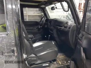 2015 Jeep Wrangler Unlimited Sahara with VIN 1C4BJWEG6FL688382, listed as a IAAI auction lot 41620621 with 138,119 mi miles. Bid and sale history available at carsss.com. Image 5.