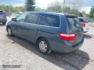 2006 Honda Odyssey EX-L with VIN 5FNRL38716B083630, listed as a IAAI auction lot 42017538 with 297,592 mi miles. Bid and sale history available at carsss.com. Image 3.