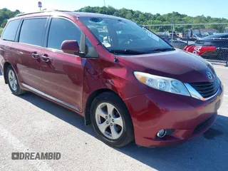 2014 Toyota Sienna LE AAS with VIN 5TDKK3DC9ES439226, listed as a IAAI auction lot 42315159 with 202,990 mi miles and . Bid and sale history available at DreamBid. Image 1.