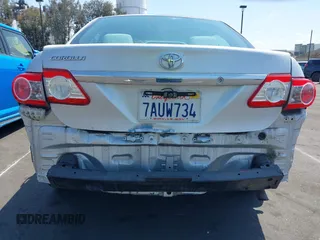 2013 Toyota Corolla L with VIN 5YFBU4EE3DP207633, listed as a IAAI auction lot 42131218 with 89,899 mi miles and . Bid and sale history available at DreamBid. Image 6.