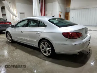 2014 Volkswagen CC VR6 Executive 4Motion with VIN WVWGU7AN5EE525409, listed as a Copart auction lot 83964324 with 118,465 mi miles and Salvage Title. Bid and sale history available at carsss.com. Image 2.