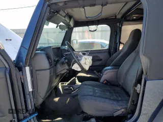 2003 Jeep Wrangler X with VIN 1J4FA39S53P363235, listed as a Copart auction lot 47496685 with 236,575 mi miles and Salvage Title. Bid and sale history available at carsss.com. Image 7.