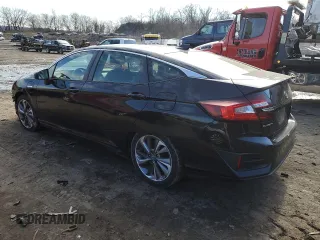 2018 Honda Clarity Plug-In Hybrid with VIN JHMZC5F13JC003825, listed as a Copart auction lot 39572674 with 49,553 mi miles. Bid and sale history available at carsss.com. Image 2.