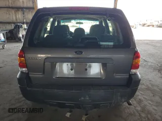2006 Ford Escape XLS with VIN 1FMYU02ZX6KC49160, listed as a Copart auction lot 77269514 with 189,984 mi miles and Salvage Title. Bid and sale history available at carsss.com. Image 6.