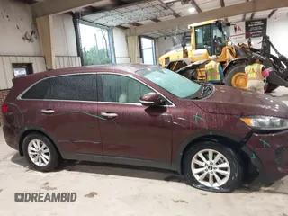 2019 Kia Sorento L with VIN 5XYPG4A34KG548624, listed as a IAAI auction lot 42020831 with 124,226 mi miles. Bid and sale history available at carsss.com. Image 13.