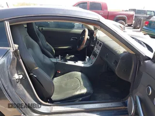 2006 Chrysler Crossfire Limited z VIN 1C3AN69LX6X066596, wystawiony jako IAAI lot #42315568 z przebiegiem 145 180 mil mil oraz . Historia ofert i sprzedaży dostępna na DreamBid. Obrazek 5.